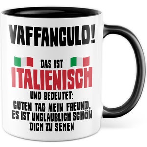 May include: White ceramic mug with a black rim and handle. The mug has black text that reads "VAFFANCULO!"  "DAS IST ITALIENISCH" and "UND BEDEUTET: GUTEN TAG MEIN FREUND, ES IST UNGLAUBLICH SCH&Ouml;N DICH ZU SEHEN". There are two small Italian flag graphics on the mug.