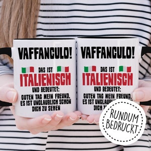 May include: Two white mugs with black handles and black text that reads "VAFFANCULO!"  The text continues with "DAS IST ITALIENISCH UND BEDEUTET: GUTEN TAG MEIN FREUND, ES IST UNGLAUBLICH SCH&Ouml;N DICH ZU SEHEN".  The mugs have a red, white, and green Italian flag graphic on each side.  The text "RUNDUM BEDRUCKT" is printed in a circle on the right mug.