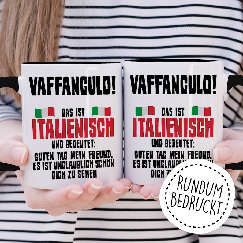 May include: Two white mugs with black handles and black text that reads "VAFFANCULO!"  The text continues with "DAS IST ITALIENISCH UND BEDEUTET: GUTEN TAG MEIN FREUND, ES IST UNGLAUBLICH SCH&Ouml;N DICH ZU SEHEN".  The mugs have a red, white, and green Italian flag graphic on each side.  The text "RUNDUM BEDRUCKT" is printed in a circle on the right mug.