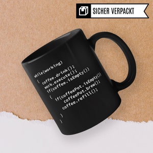 May include: Black coffee mug with white text that reads "while (working) { coffee.drink(); work.execute(); if(coffee.isEmpty()) { if(coffeePot.isEmpty()) coffeePot.brew(); coffee.refill(); } }"
