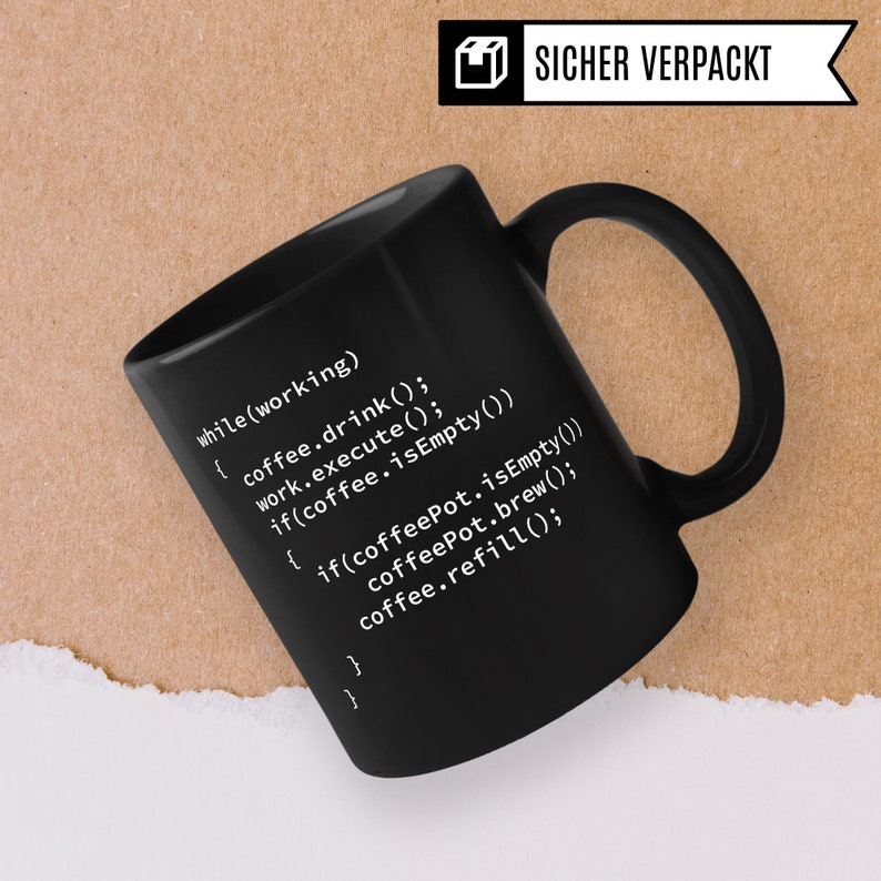 May include: Black coffee mug with white text that reads "while (working) { coffee.drink(); work.execute(); if(coffee.isEmpty()) { if(coffeePot.isEmpty()) coffeePot.brew(); coffee.refill(); } }"