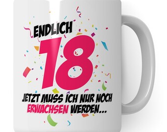 Può includere: Tazza in ceramica bianca con un numero 18 rosa e il testo "ENDLICH 18 JETZT MUSS ICH NUR NOCH ERWACHSEN WERDEN..." circondato da coriandoli colorati.