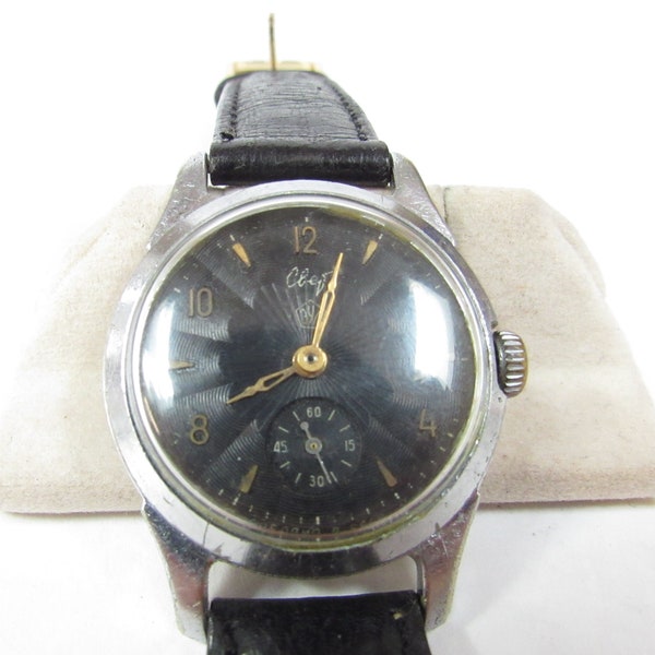 Soviet Russia 1960S Mechanical Steel Wrist Watch with Black Face . Looks like the name is Clef / Runs