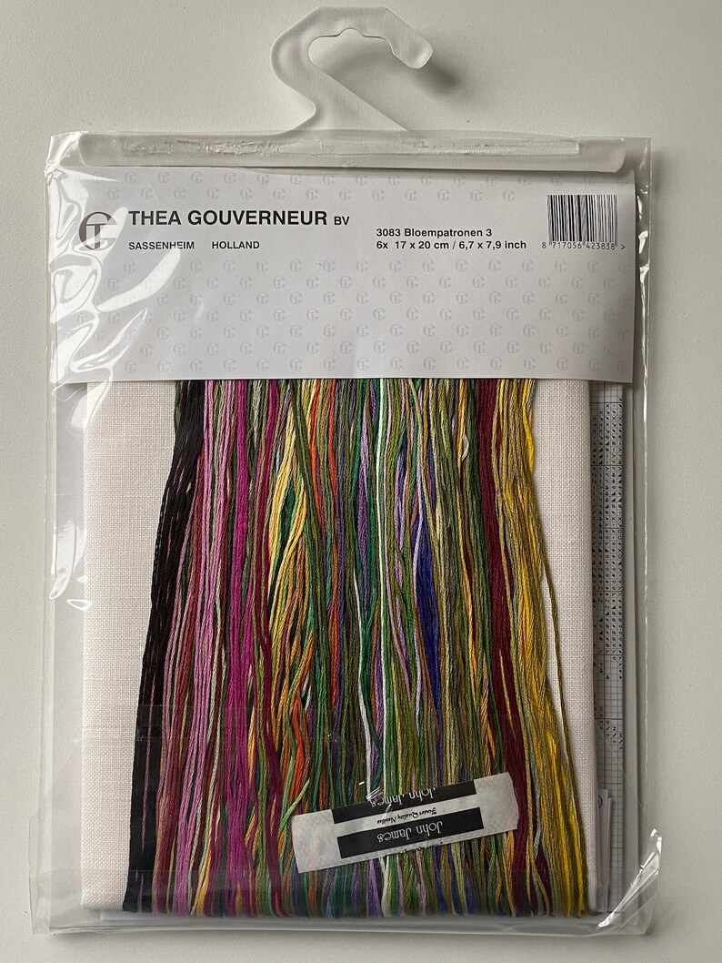 Hello everyone, I have finally decided to tackle the Thea Gouverneur Bird Table cross stitch kit. Unfortunately, I've had it for such an age that the antique white linen has become dreadfully