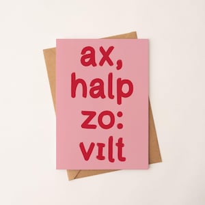 Könnte beinhalten: Rosa Karte mit dem Text "ax, half zo: vilt" in Rot.