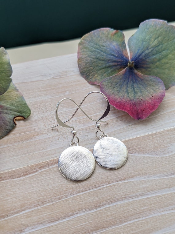 Silver disc earrings online