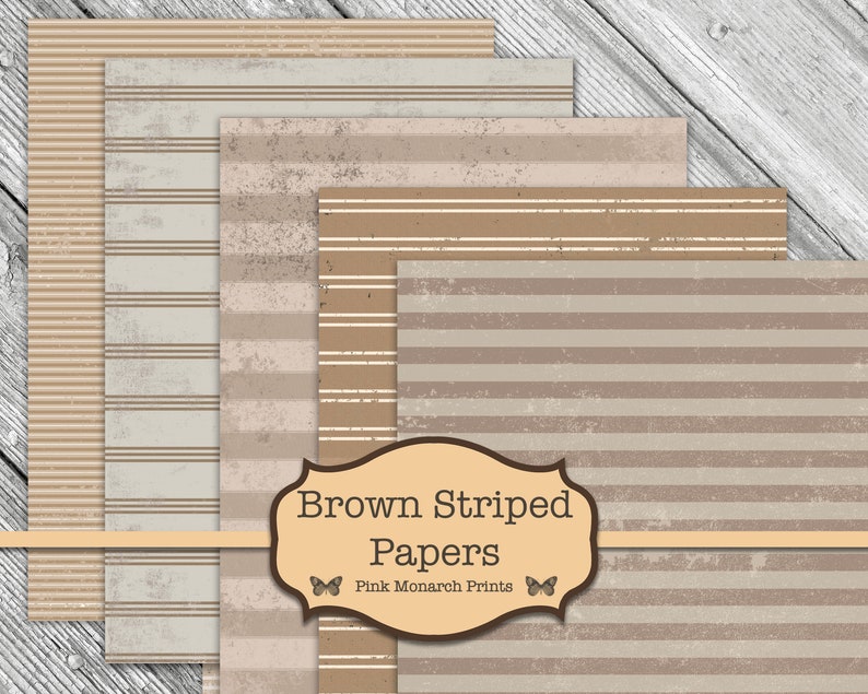 K&ouml;nnte beinhalten: Vier Bl&auml;tter braunes und wei&szlig; gestreiftes Papier mit einem abgenutzten Look. Das Papier ist mit "Brown Striped Papers" beschriftet, mit einem Schmetterlingslogo und dem Text "Pink Monarch Prints".