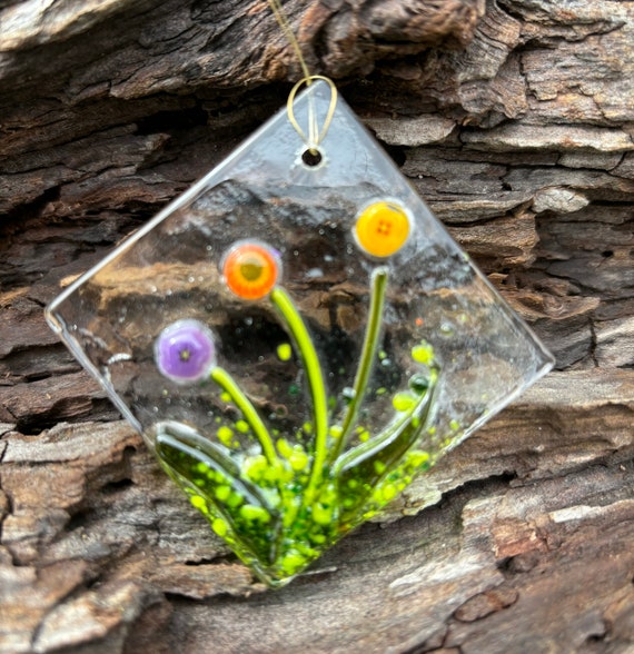Kleine Blumen diagonal Glasbild