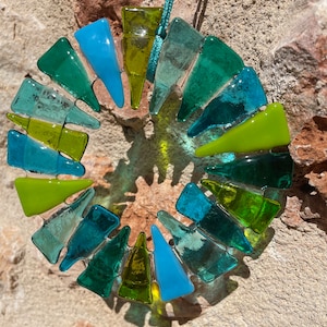 Glass wreath in blue-green turquoise