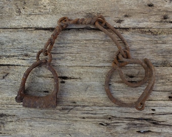 Antique leg irons, 1700s wrought iron legcuffs, old rusty hand forged restraints, collectible 18th century shackles