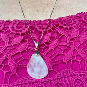 Clear Quartz Crystal Necklace With Red Inclusions