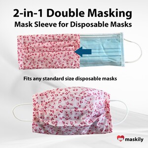 May include: A pink floral fabric mask sleeve that fits over a disposable face mask. The sleeve is shown with a blue disposable mask inside. The text "2-in-1 Double Masking Mask Sleeve for Disposable Masks" is at the top of the image. The text "Fits any standard size disposable masks" is in the middle of the image. The text "maskily" is at the bottom of the image.