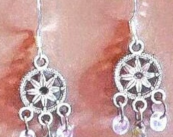 Bohemian style earrings, silver dream catcher charm, with Czech green and clear glass beads.