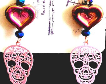This is an awesome Valentines gift. Pink  lacy skull earring,with  bright pink czech heart. Dangle  earring. Earring is hypoallergenic,