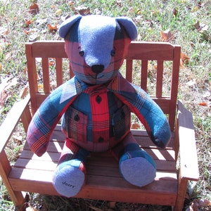Memory bear approximately 18 inches from head to toe and 14 inches in sitting position