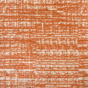 May include: Close-up of a textured fabric with a white and orange pattern. The fabric has a woven appearance and a slightly rough texture.