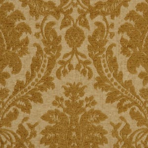 May include: A beige fabric with a gold damask pattern. The pattern features intricate floral designs and swirls.
