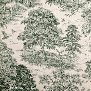 May include: A green and white toile fabric featuring a woodland scene with trees, birds, and a deer. The fabric has a vintage look and feel.