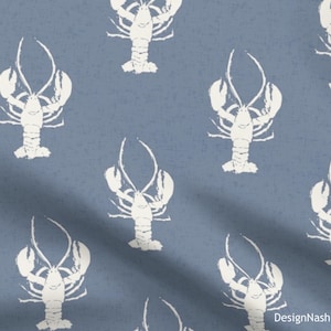 May include: A blue fabric with a repeating pattern of white lobster illustrations. The lobsters are stylized with a textured, distressed appearance, creating a nautical or coastal theme. The background has a subtle, mottled texture.