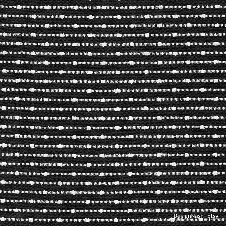 May include: Black and white fabric with a repeating pattern of horizontal lines of small white dots.