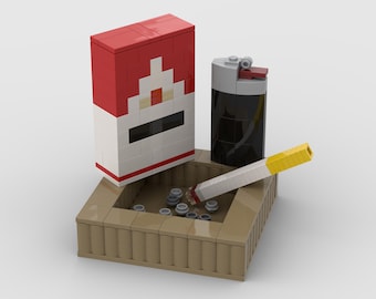 Pacchetto di sigarette con accendino e sigaretta sul posacenere. Una replica divertente e unica, in scala 1:1, realizzata con mattoncini LEGO® originali.