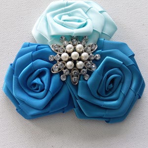 blue satin brooch