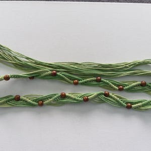 green macrame belt with beads