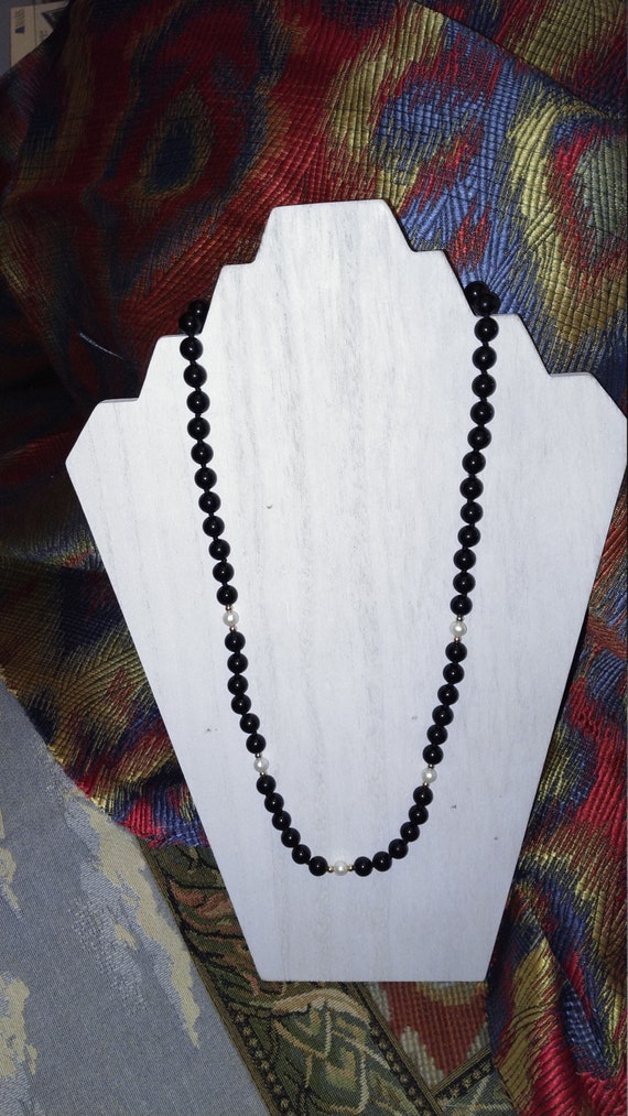 Black bead and pearl necklace with 14kt gold clasp