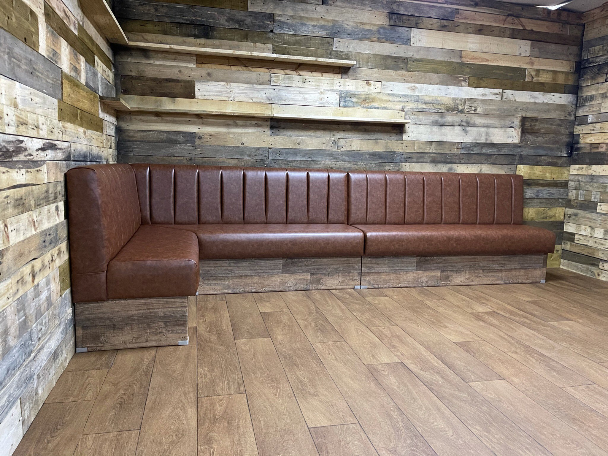 Booth corner seating outlet