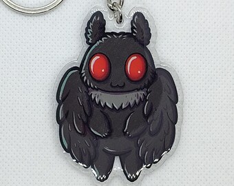 Breloque en acrylique chibi homme-papillon