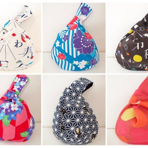May include: Six fabric bags with different patterns. The bags are made of cotton and have a drawstring closure. The patterns include floral, geometric, and abstract designs. The bags are all in different colors, including blue, red, black, and white.