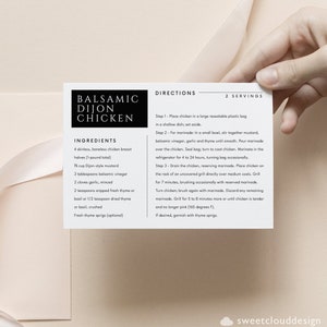 May include: Printable recipe card with a black and white design. The card features a recipe for Balsamic Dijon Chicken with a list of ingredients and directions. The card is on a pink background with a white ribbon.