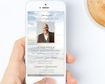 May include: A digital phone screen displaying a memorial service announcement for Ethan Martin Rogers. The announcement includes the date, time, and location of the service and reception. A photo of the deceased is included in the announcement.