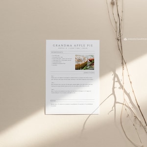 May include: Printable recipe card for Grandma's Apple Pie. The card features a photo of a pie with a flaky crust and a white meringue topping. The recipe includes ingredients and directions for making the pie.