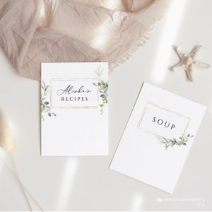 May include: Two printable recipe cards with a gold frame and green watercolor leaves. The top card says "Alisha's Recipes" and the bottom card says "Soup".