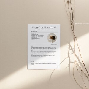 May include: Printable recipe card for chocolate cookies with a photo of a stack of cookies. The recipe card includes ingredients, directions, and notes. The card is printed on white paper with black text.