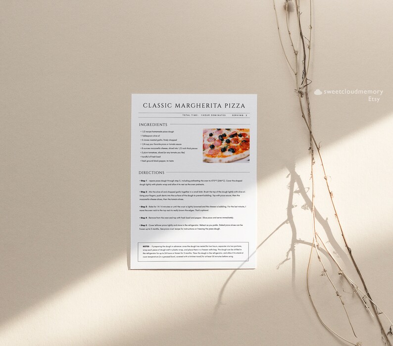 May include: Printable recipe card for classic Margherita pizza with a photo of a finished pizza. The recipe includes ingredients and directions for making the pizza.