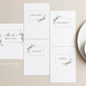 May include: Five white cards with gold frames and green foliage designs. The cards are labeled "Alisha's Recipes", "Soup", "Salad", "Entrees", and "Dessert".
