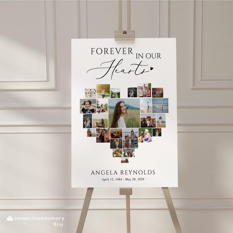 May include: A white poster with a heart-shaped photo collage of a person. The text "FOREVER IN OUR HEARTS" is at the top of the poster. The text "ANGELA REYNOLDS April 12, 1984 - May 20, 2029" is at the bottom of the poster.