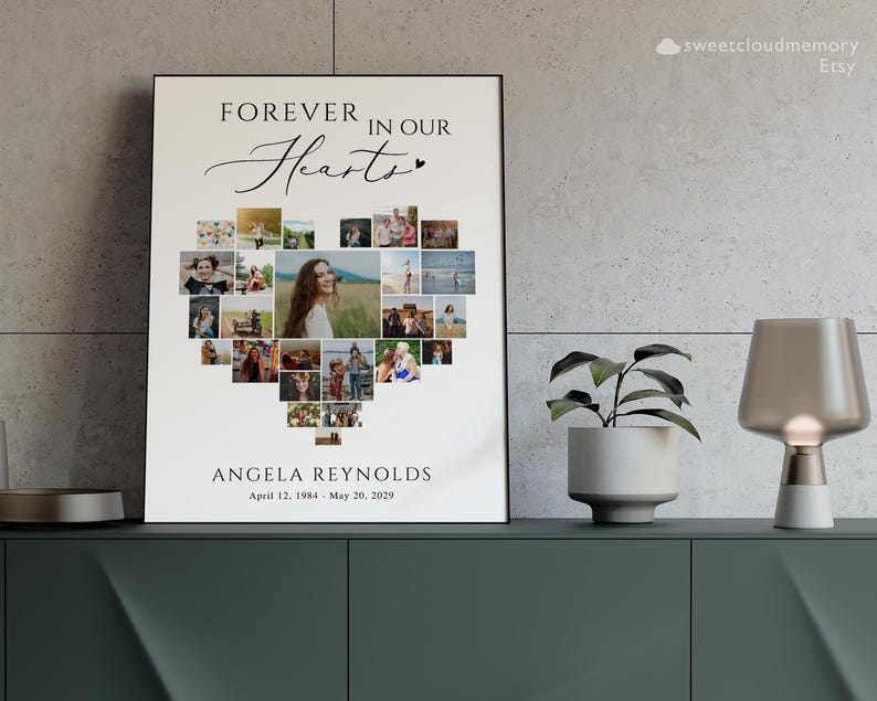 May include: A white canvas print with a heart-shaped photo collage. The text "FOREVER IN OUR Hearts" is at the top of the print. The text "ANGELA REYNOLDS April 12, 1984 - May 20, 2029" is at the bottom of the print.