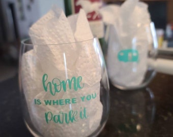 Campers' stemless wine/drinkglass for campers. Lightweight, strong acrylic with message "Home is where you park it"