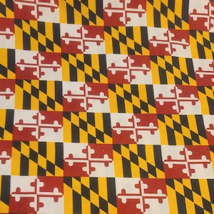 May include: A repeating pattern of the Maryland state flag. The flag is yellow, black, red, and white with a red and white cross in the center.