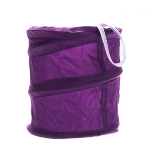 May include: A purple collapsible laundry hamper with a white drawstring.