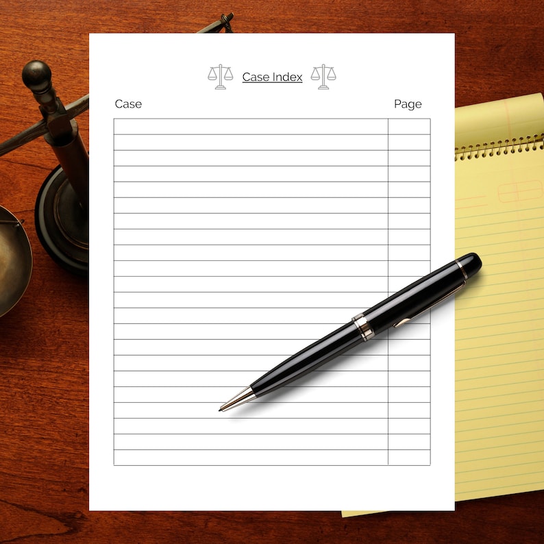 May include: A blank white sheet of paper with the title "Case Index" and two scales of justice symbols. The paper has lines for writing and a column labeled "Case" and a column labeled "Page". A black pen is lying on the paper.