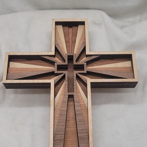 Layered wooden cross Walnut top layer.