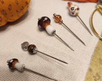 Brown and white spotted Mushroom pins