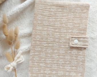 Customizable baby and child health record book cover in cotton gauze