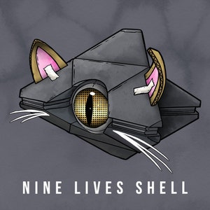 May include: A gray, geometrically shaped object with a cat-like design. It has a large, golden eye with a black pupil and pink ears with gold trim. The object has white whiskers and the text "NINE LIVES SHELL" is printed below it.