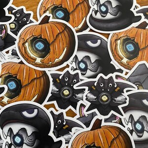 May include: A collection of Halloween-themed stickers featuring a variety of characters and designs. The stickers are printed on white paper and have a glossy finish. The characters include a pumpkin, a bat, and a ghost. The designs are all related to the theme of Halloween.