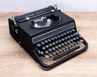 Spanish QWERTY - Hispano OLIVETTI Studio 46 Typewriter - Black Textured Finish - Carefully Serviced And Ready to Type